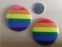 Large Gay Pride Rainbow Badges versus 10p size