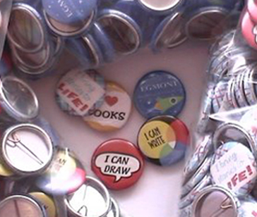 Badges to promote book launch