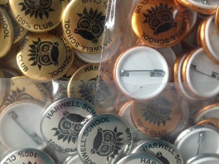 Metallic finish button badges